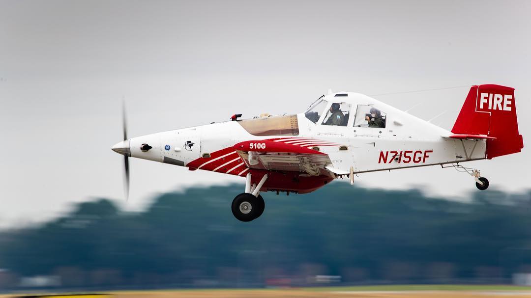 GFC SEAT aircraft dropping fire suppressant over Pineland Road Fire